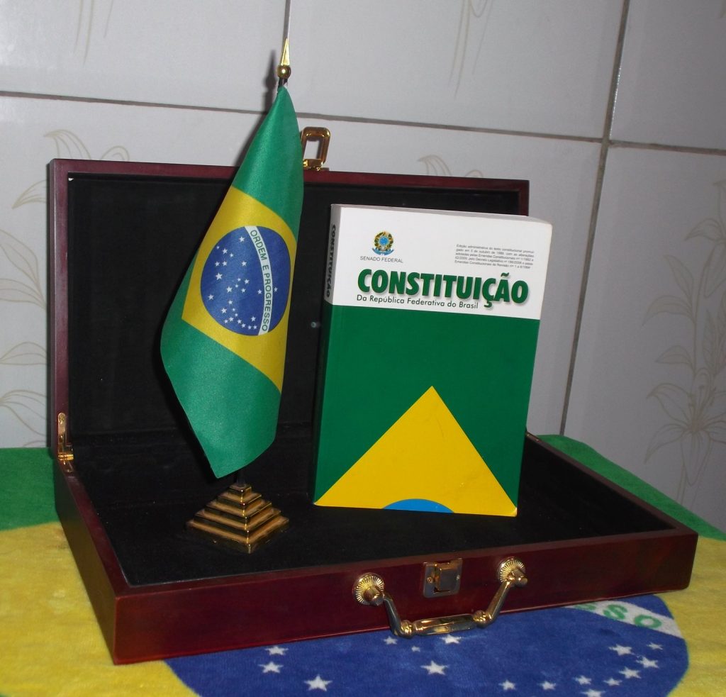 Illustrative archive photograph of a Brazilian flag and a copy of the Constitution in a presentation case, November 2013.